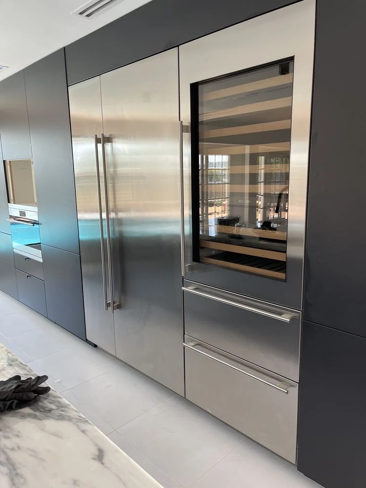 Built-in stainless refrigerator and wine column installation in Orange County