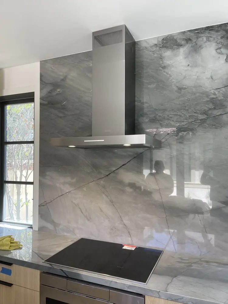 Chimney Hood & Stone Backsplash installation in Corona del Mar