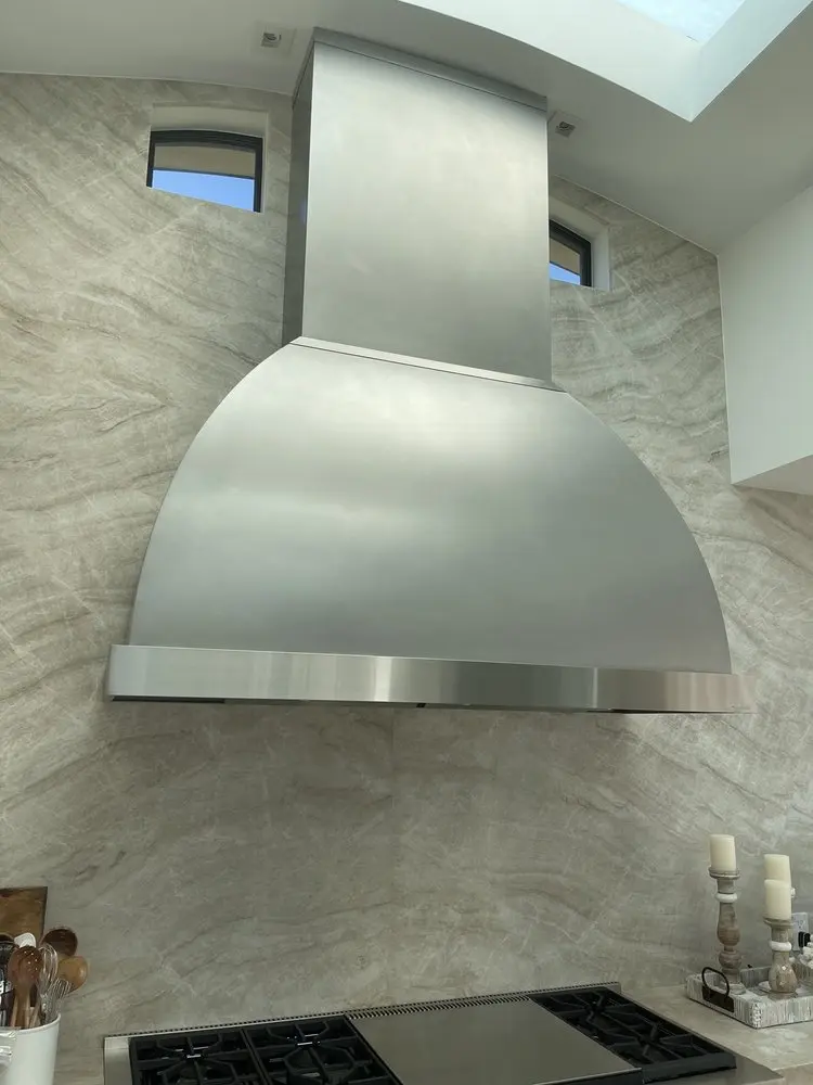 Curved Stainless Range Hood installation in Newport Coast