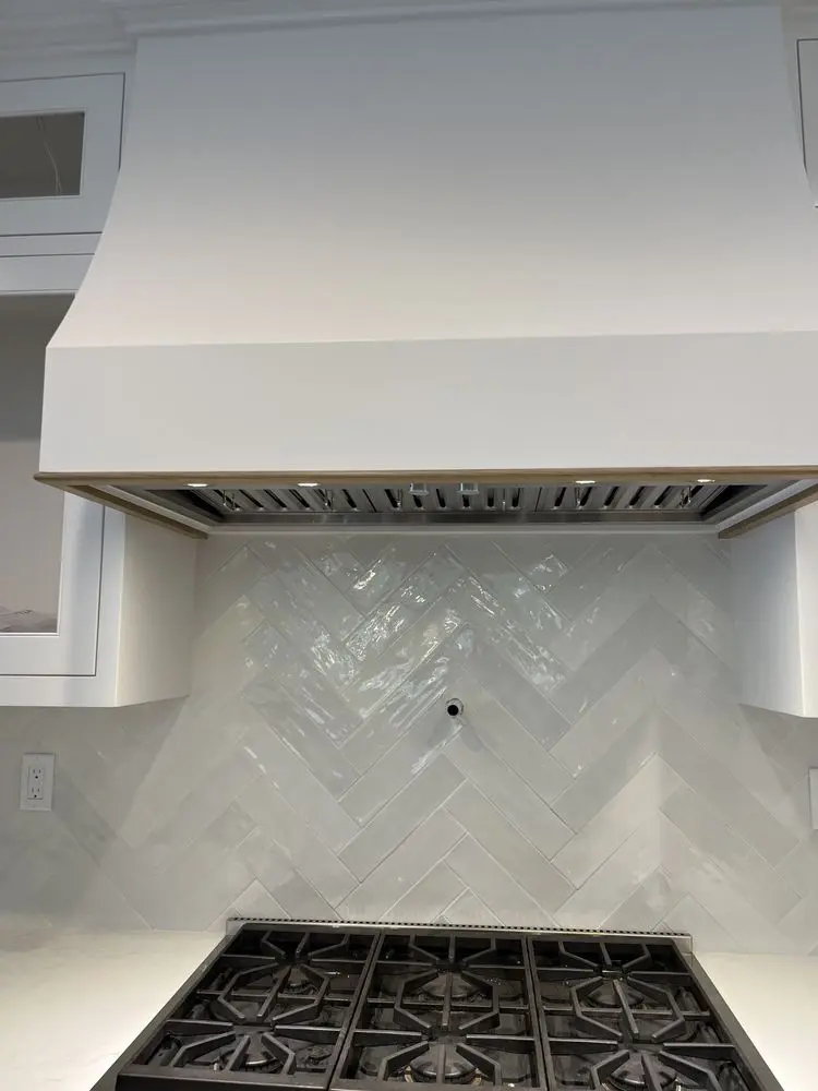 Custom Hood & Herringbone Tile installation in San Juan Capistrano