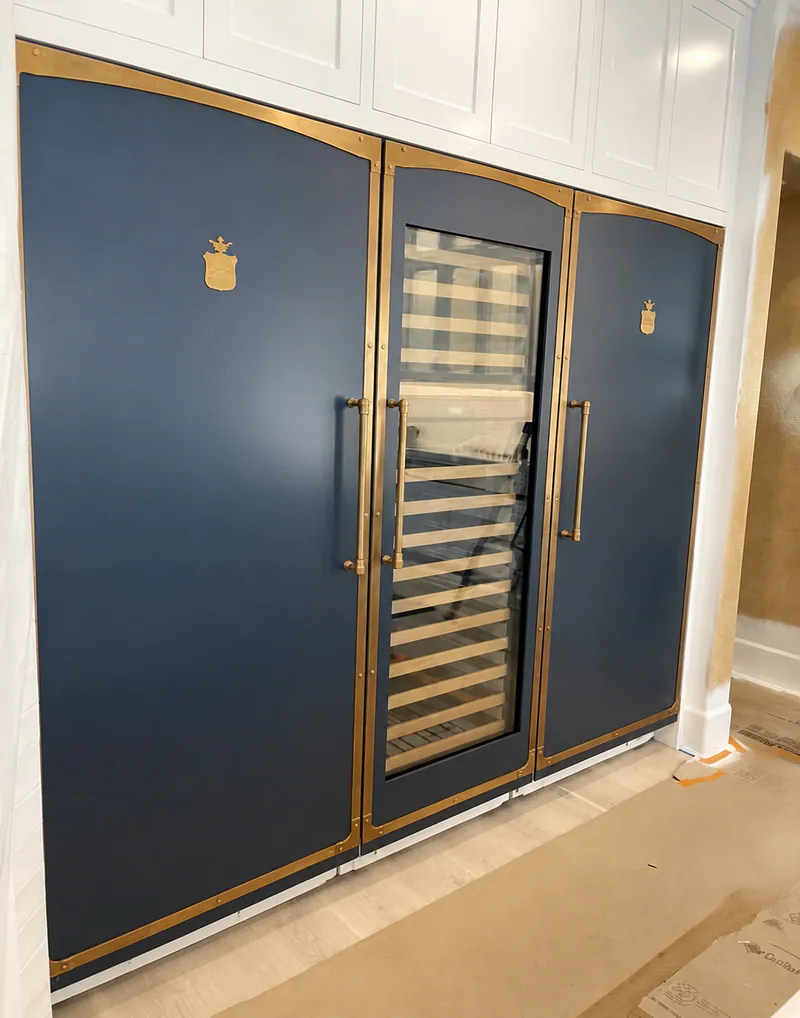 Custom-panel Sub-Zero refrigeration and wine column in Laguna Beach