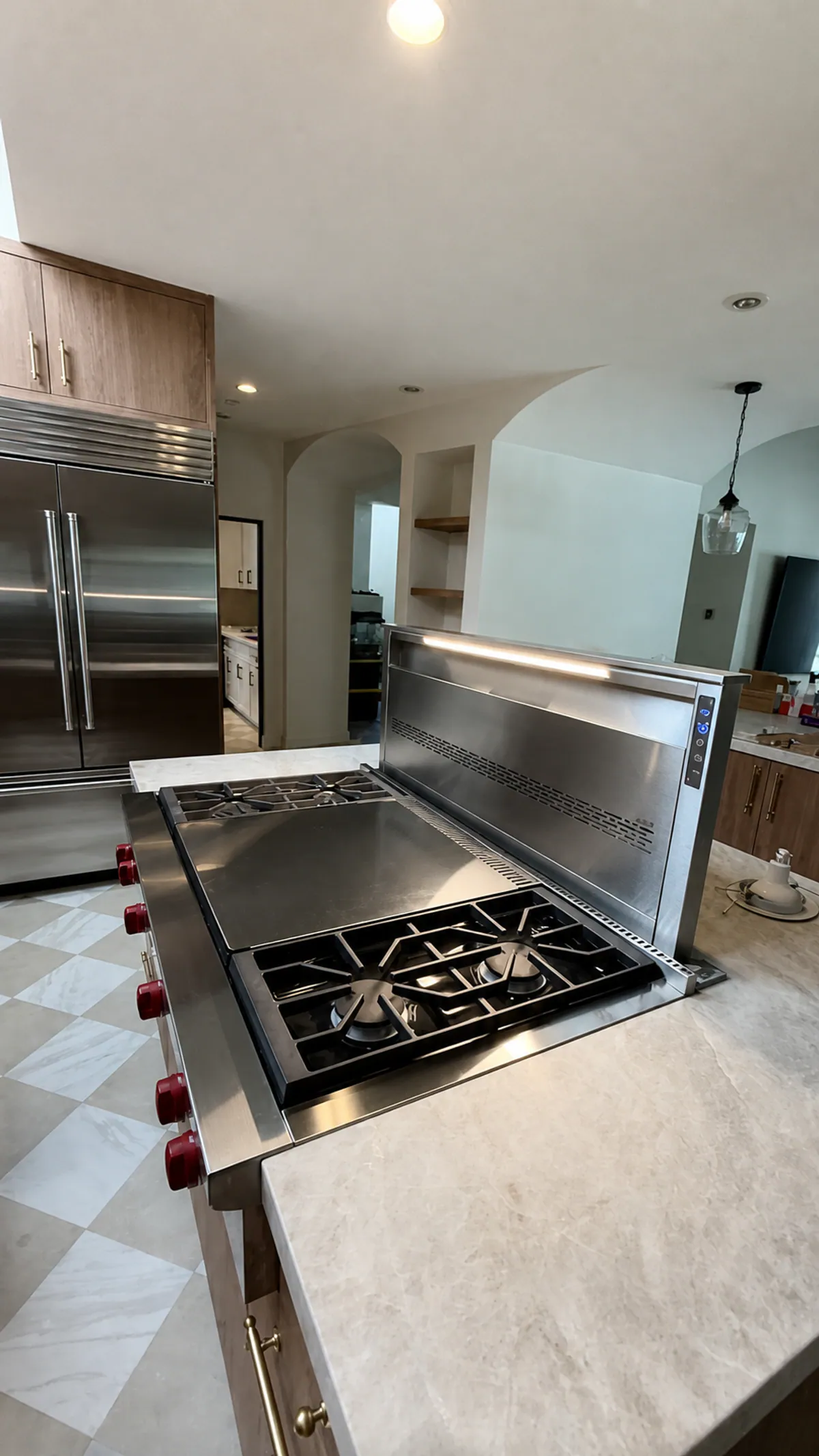 Downdraft Rangetop & Built-In Refrigerator installation by Peerless Group