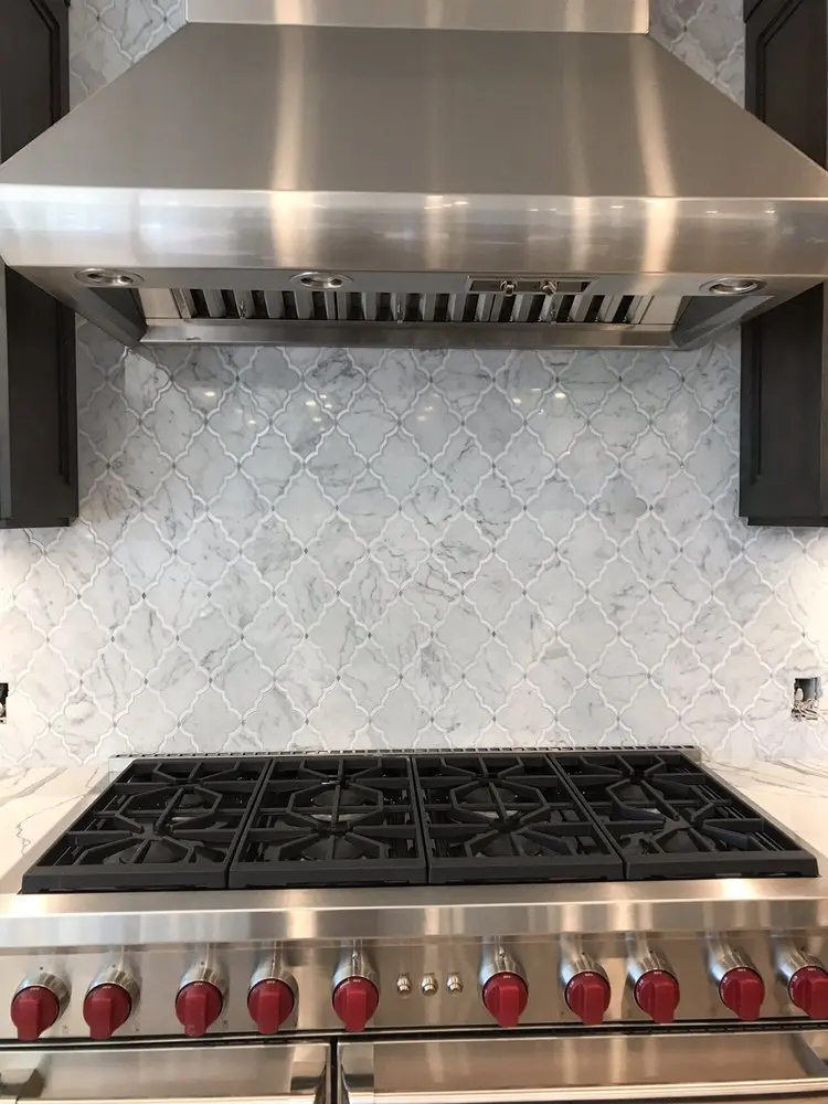 Hood & Marble Backsplash Cooktop installation in Villa Park