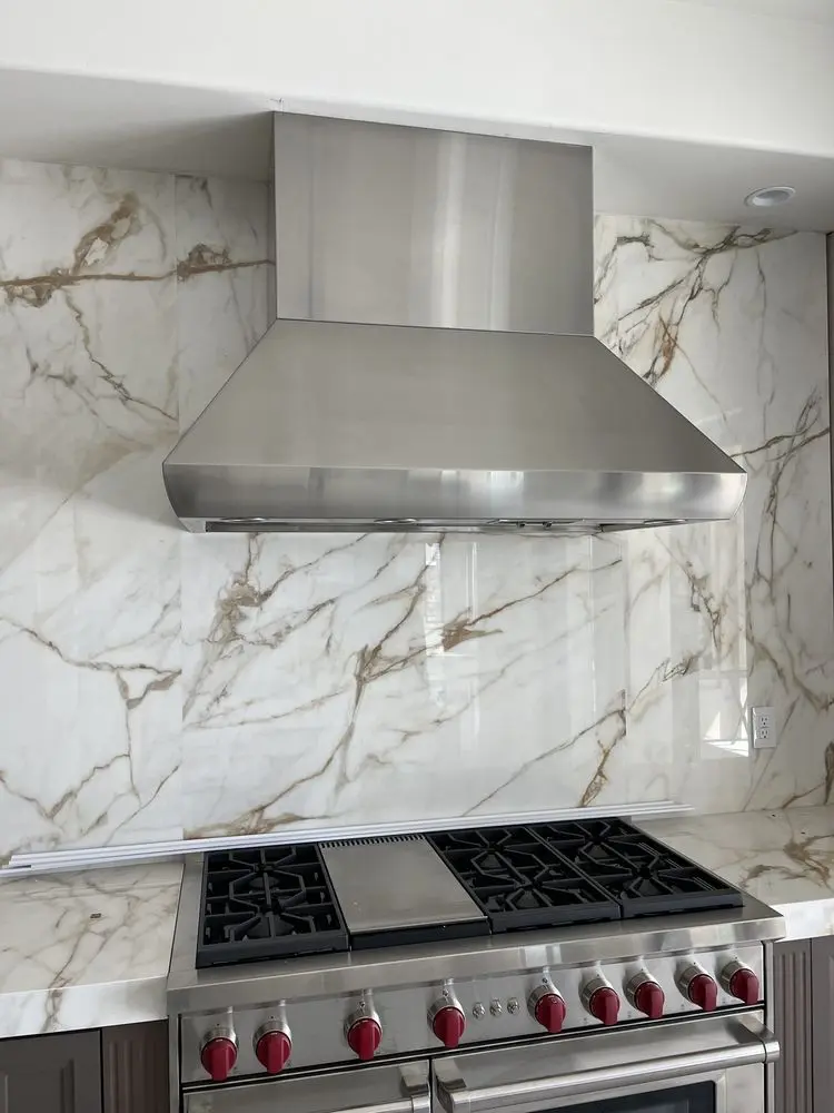 Hood on Book-Matched Marble installation in Laguna Niguel