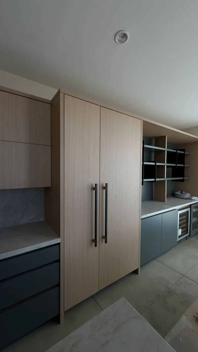Miele Columns with Custom Wood Panels installation in Laguna Beach by Peerless Group