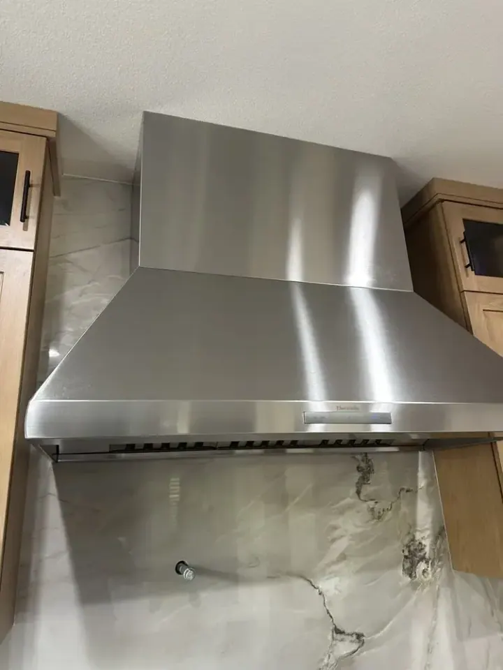 Wall-Mount Stainless Range Hood installation in Dana Point by Peerless Group