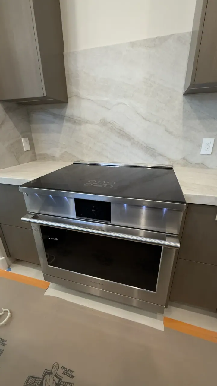 Monogram 36″ Induction Range installation in Orange by Peerless Group