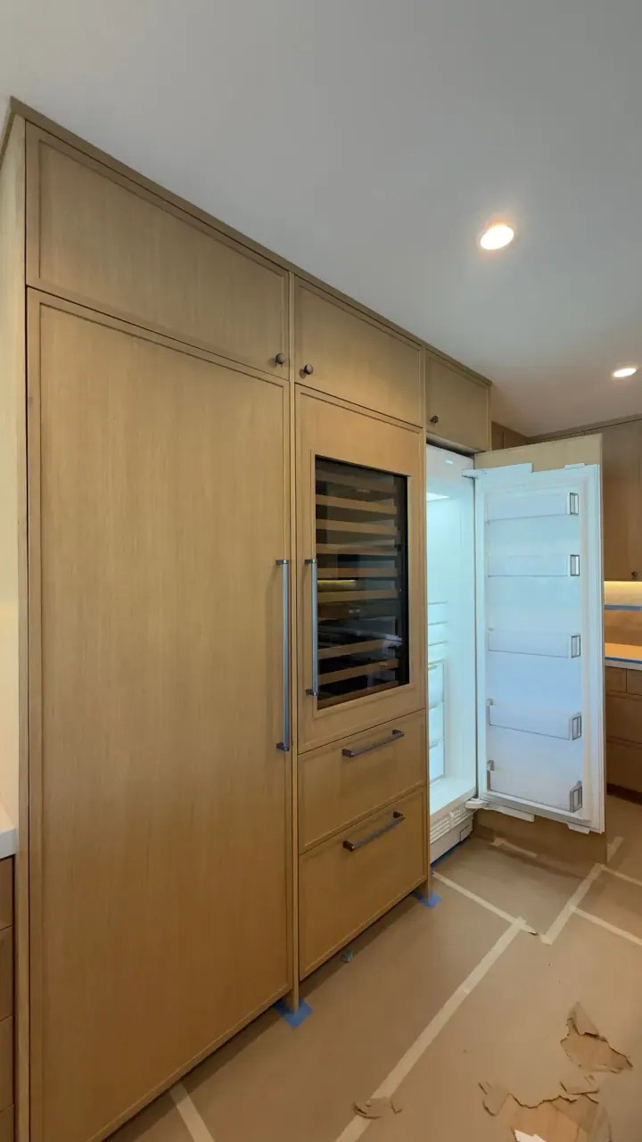 Sub-Zero Columns & Wine Column Custom Wood Panel installation in Newport Beach, CA by Peerless Group