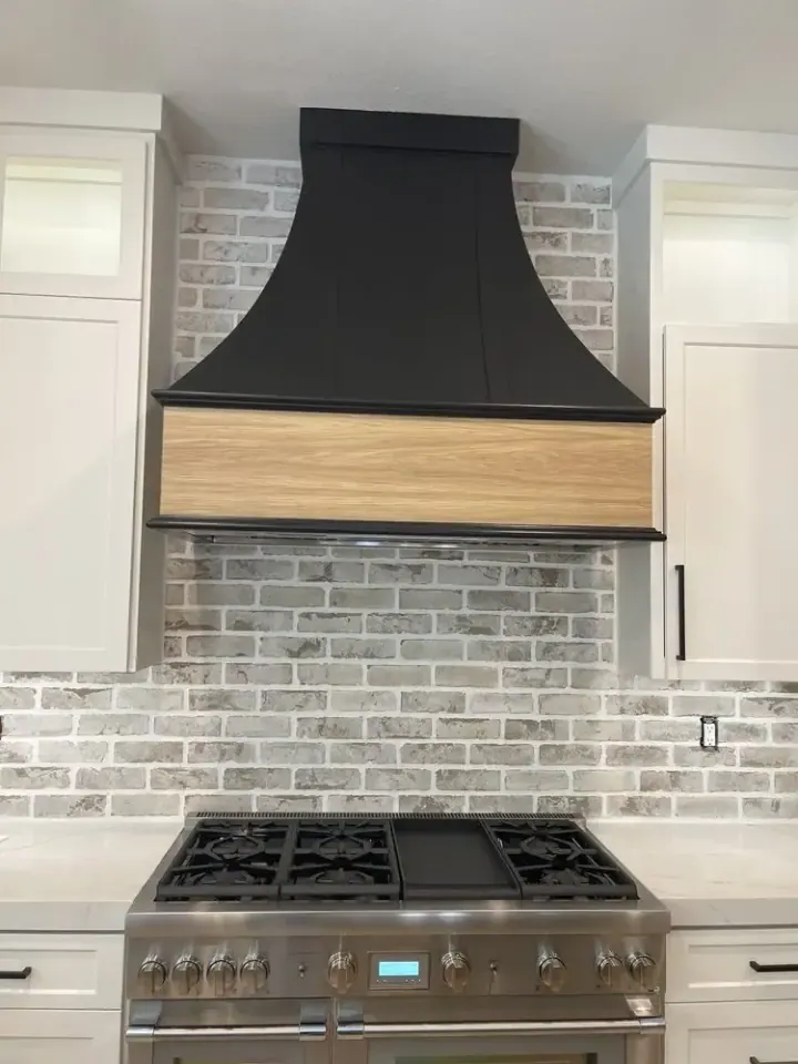 Tapered Black Vent Hood installation in San Juan Capistrano by Peerless Group