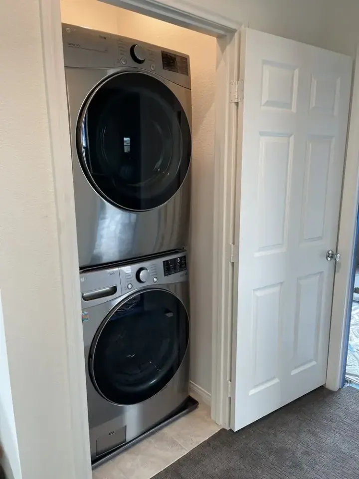 Stacked Front-Load Laundry installation in Costa Mesa, CA by Peerless Group