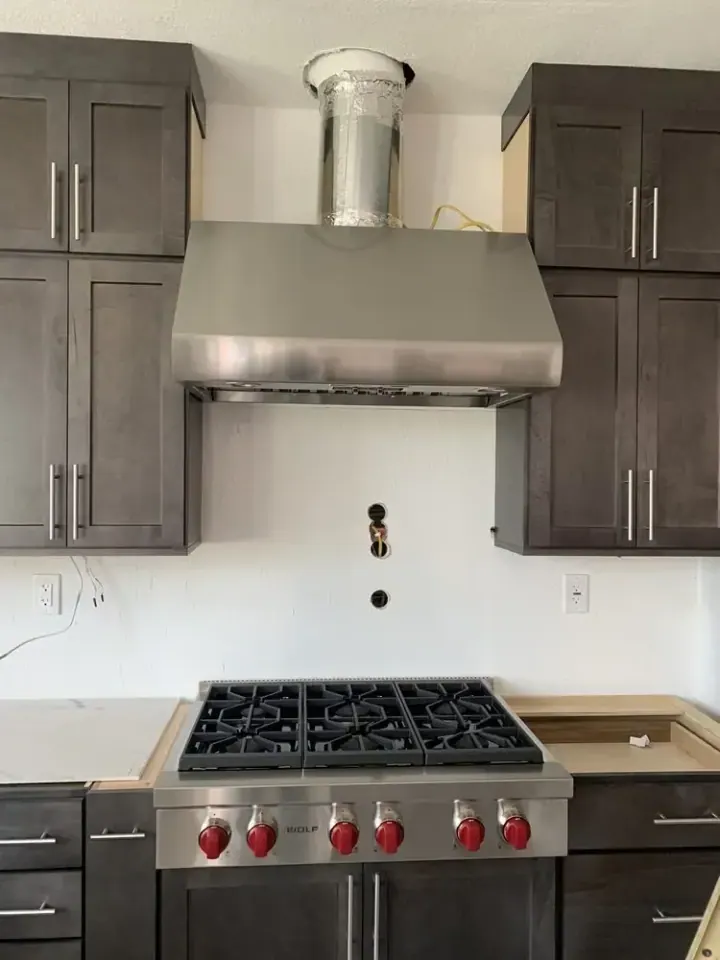 Wolf 36″ Rangetop and Wolf Hood installation in Yorba Linda by Peerless Group