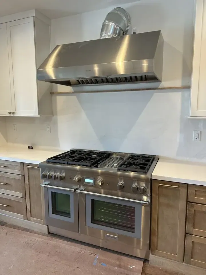 Thermador Dual Fuel & Thermador Hood installation in Orange County by Peerless Group