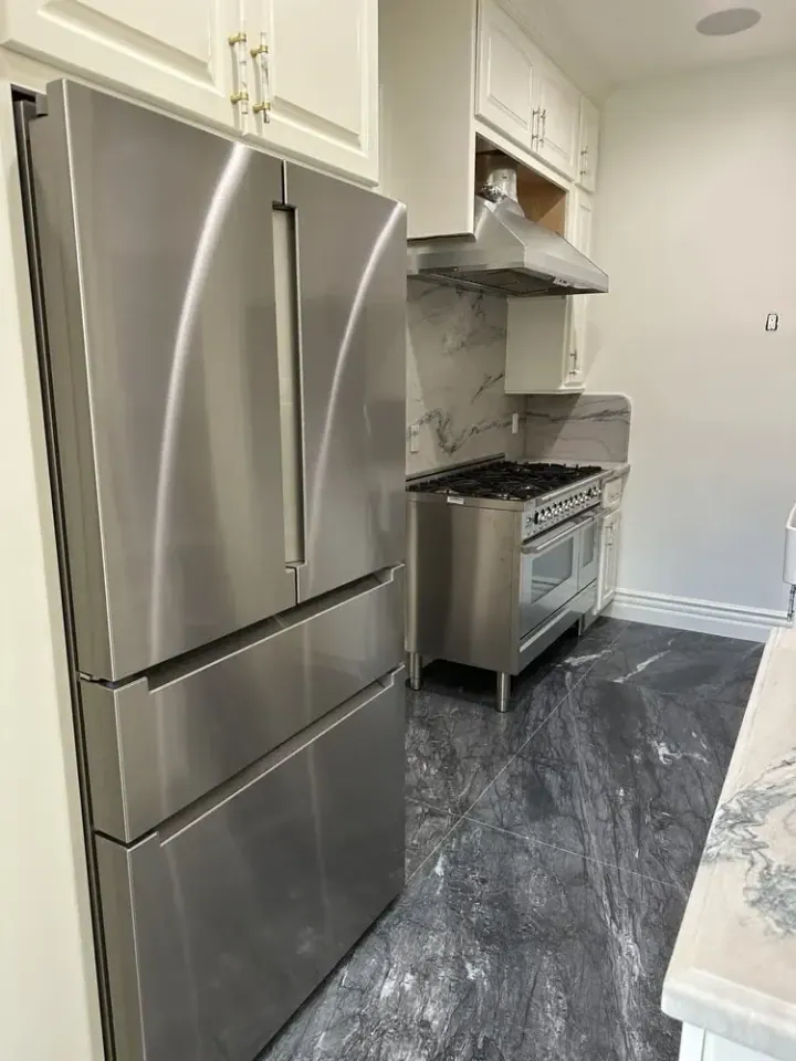 Freestanding Fridge, 48″ Range and Hood installation in Irvine by Peerless Group