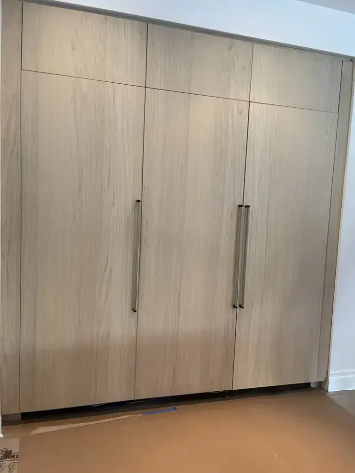 3 Sub-Zero Columns with Custom Wood Panels installation in Santa Ana by Peerless Group