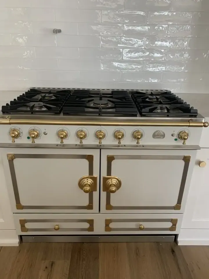 White & Gold La Cornue Range installation in Lake Forest by Peerless Group