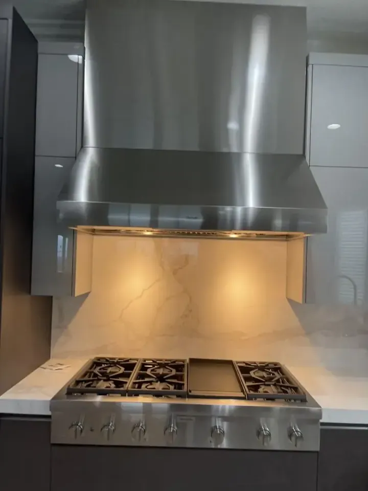 48″ Rangetop with Griddle and Thermador Hood installation in Laguna Beach by Peerless Group