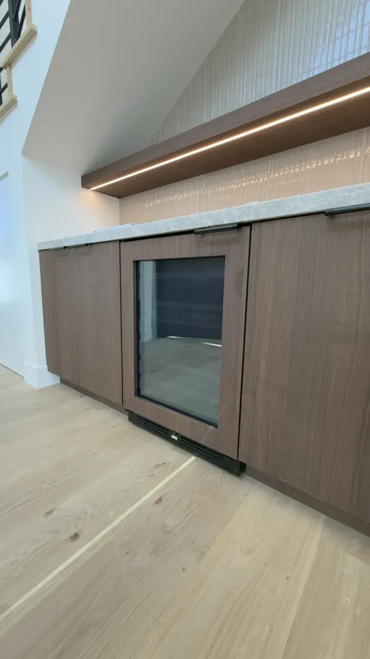 Zephyr Undercounter Wine with Custom Wood Panel installation in San Clemente, CA by Peerless Group