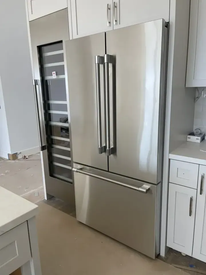 Freestanding Refrigerator & Thermador Wine Column installation in San Clemente by Peerless Group