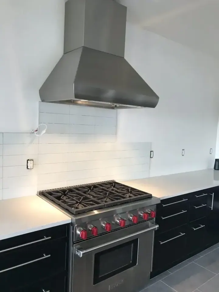 Wolf 36″ Range and Chimney Hood installation in San Juan Capistrano by Peerless Group