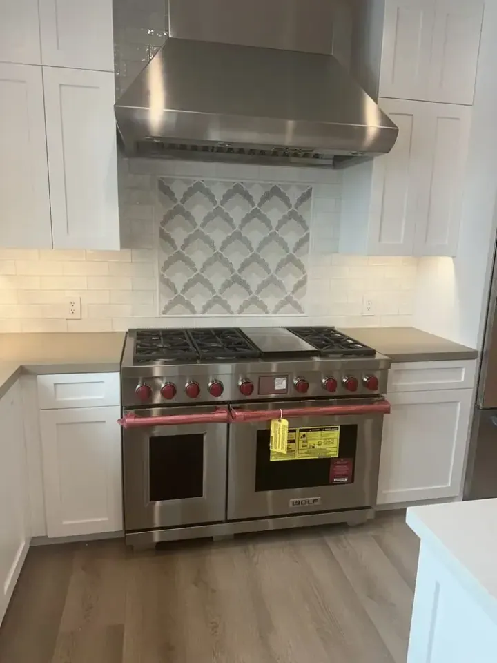 Wolf 48″ Range and Wolf Hood installation in San Juan Capistrano by Peerless Group