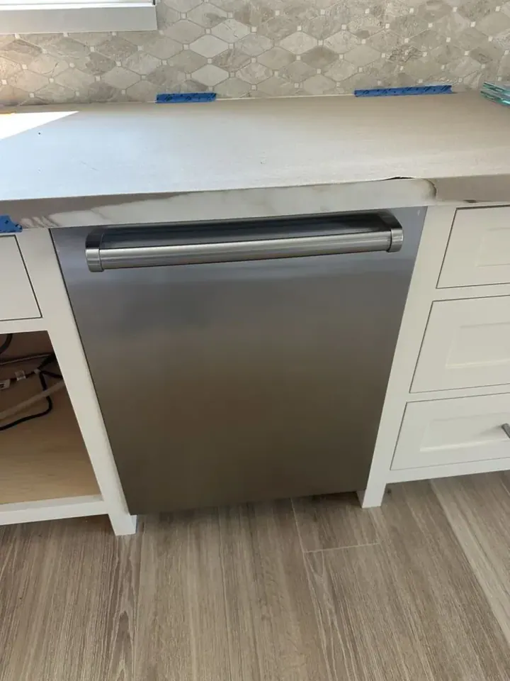 Dishwasher installation by Peerless Group