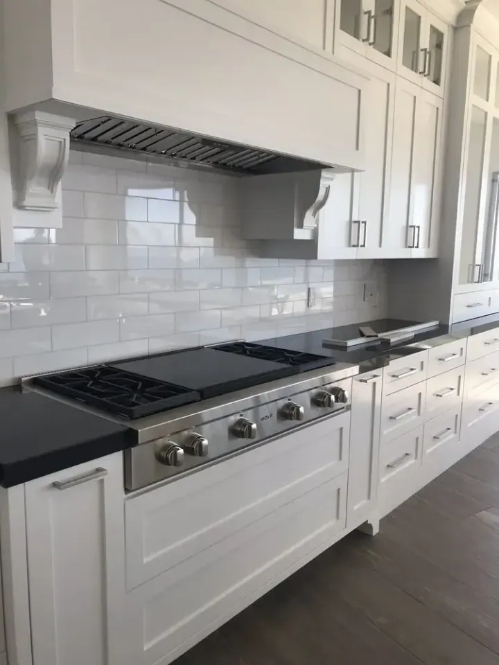 Wolf 48″ Rangetop and Wolf Liner Hood installation in Stanton by Peerless Group