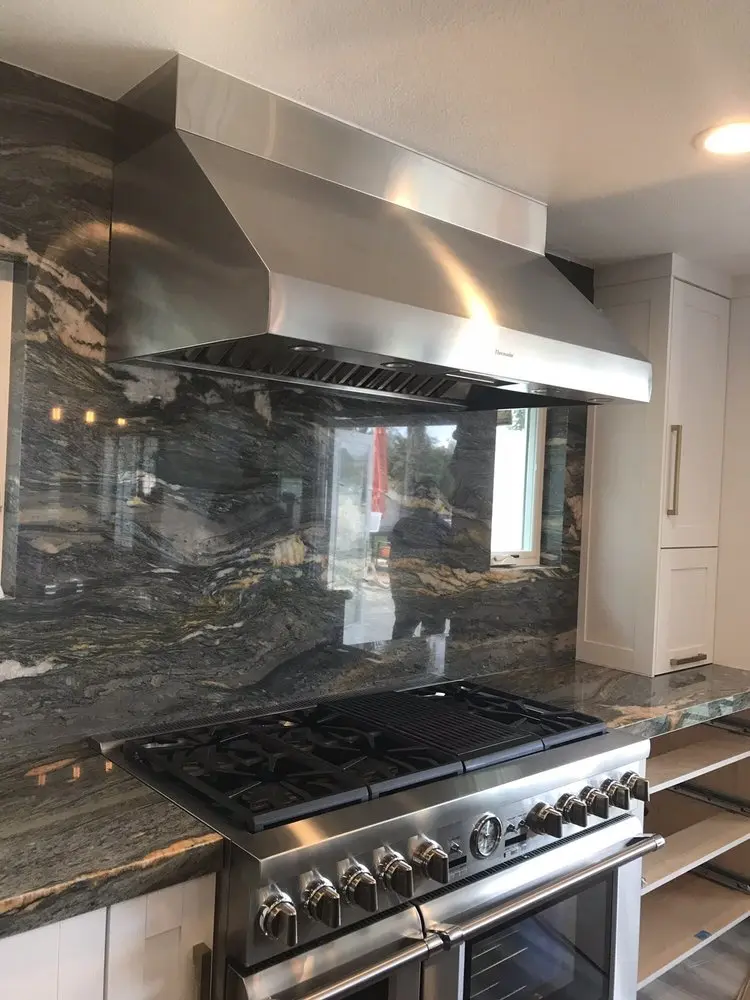 Range & Hood on Dark Marble installation in Coto de Caza
