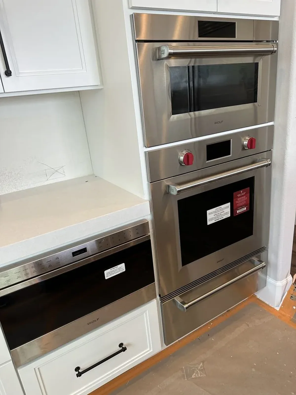Wolf Microwave Drawer, Warming Drawer, Steam Oven & Oven installation by Peerless Group