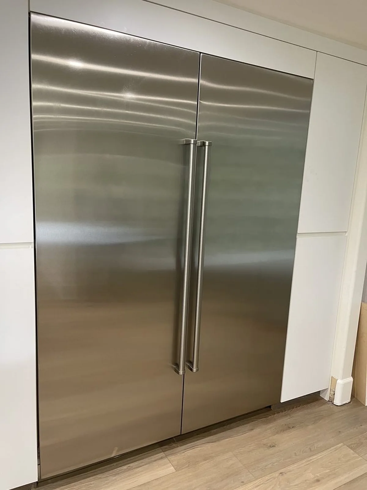 Stainless Built-In Refrigerator installation by Peerless Group