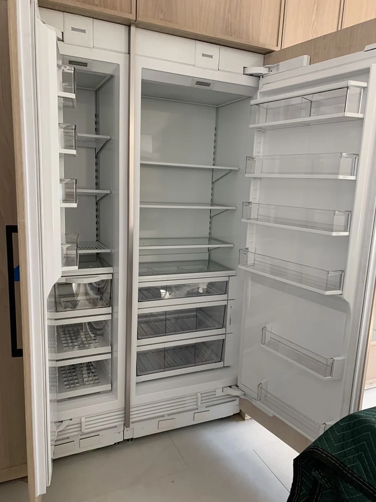 Custom-Panel Refrigerator Columns installation by Peerless Group