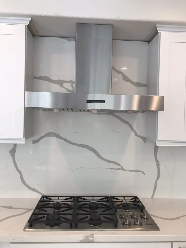 Stainless Hood on Quartz Backsplash installation in Laguna Beach