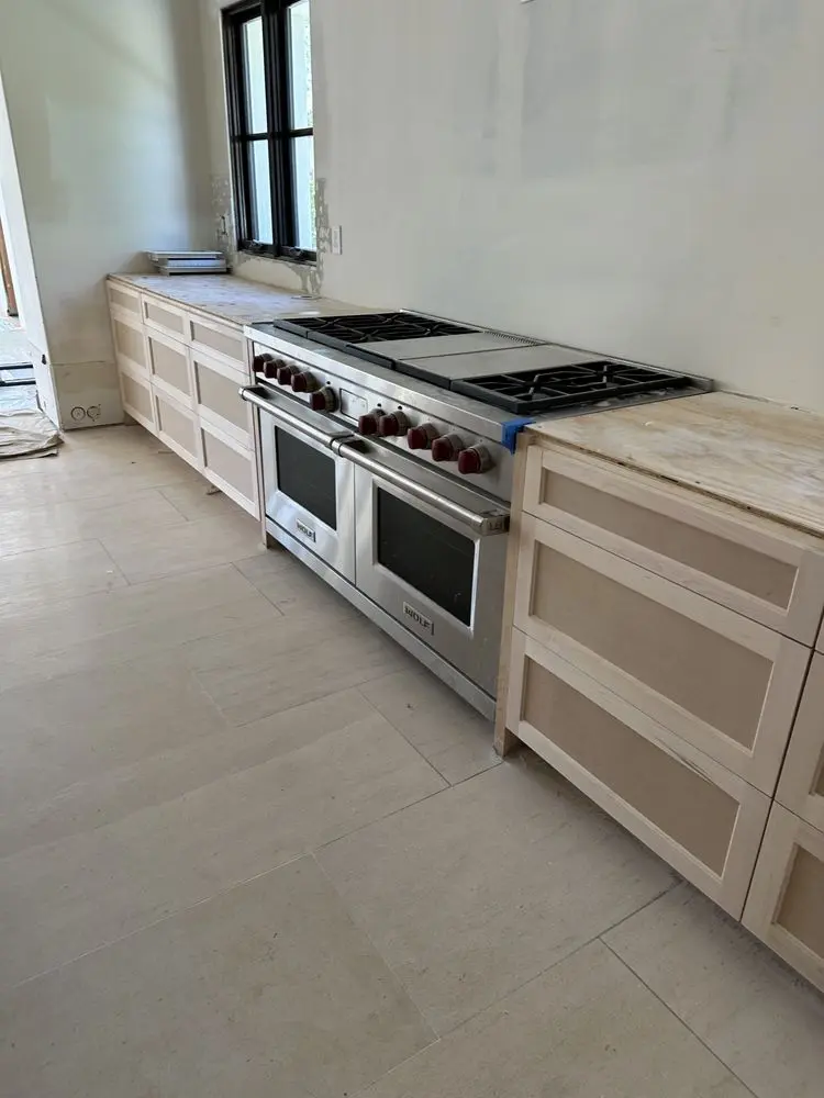 Stainless Range in Custom Cabinetry installation in Newport Beach
