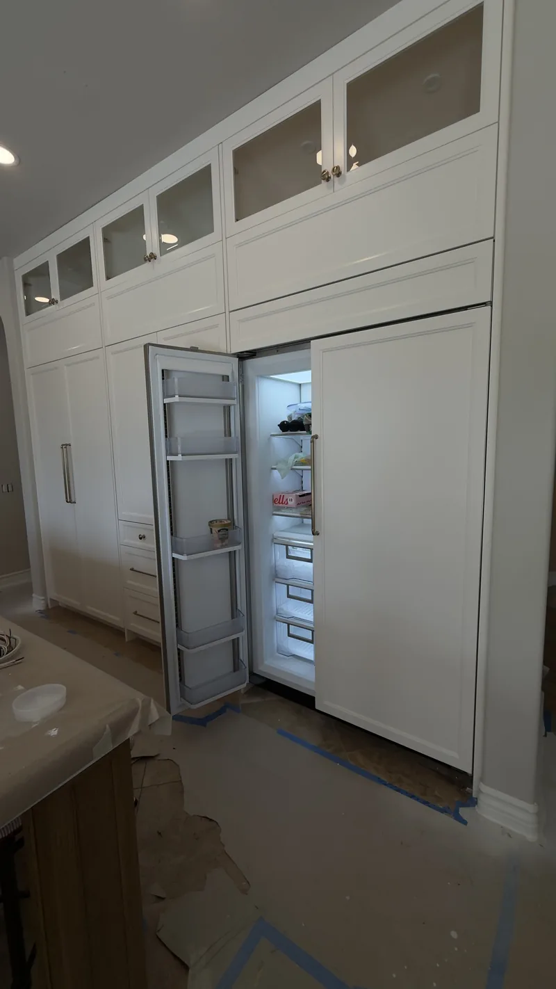 Sub-Zero 48-Inch Custom Wood Panel Fridge installation in Newport Coast by Peerless Group