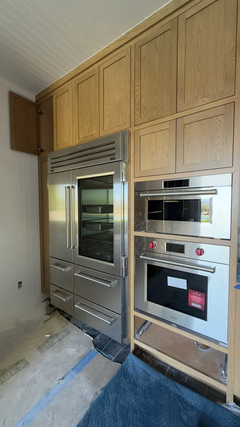 Sub-Zero 48″ PRO Refrigerator/Freezer with Glass Door & Wolf Ovens installation in San Clemente by Peerless Group