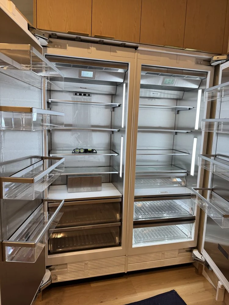 Open Sub-Zero refrigerator and freezer columns after installation in Orange County