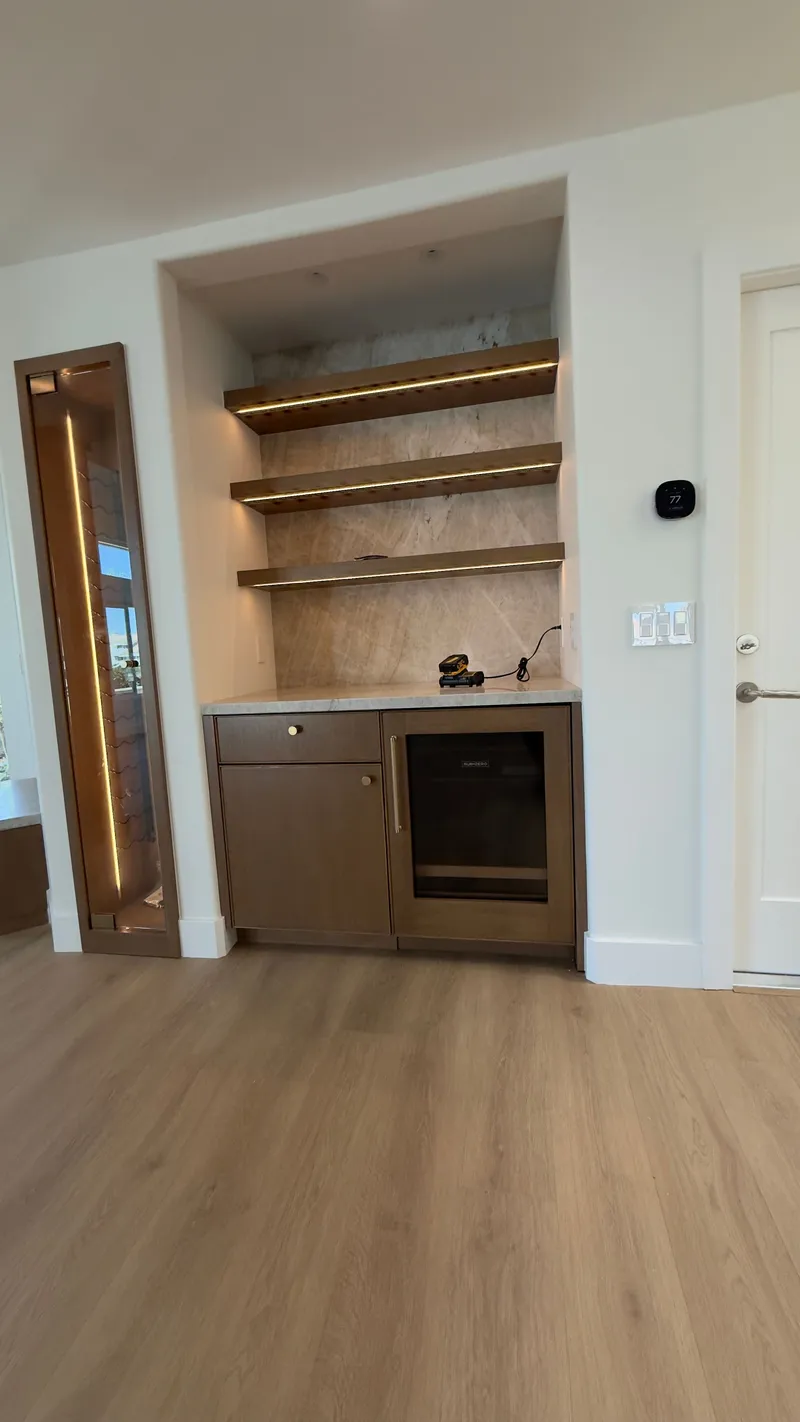 Sub-Zero Undercounter Wine Custom Wood Panel installation in Irvine by Peerless Group