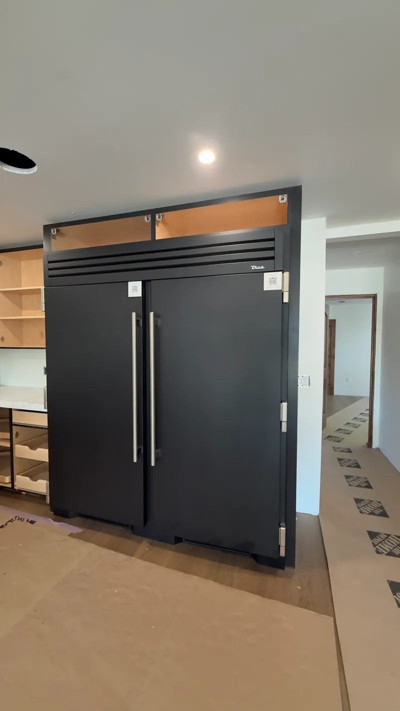 Two True Black 36″ Columns installation in Newport Beach by Peerless Group