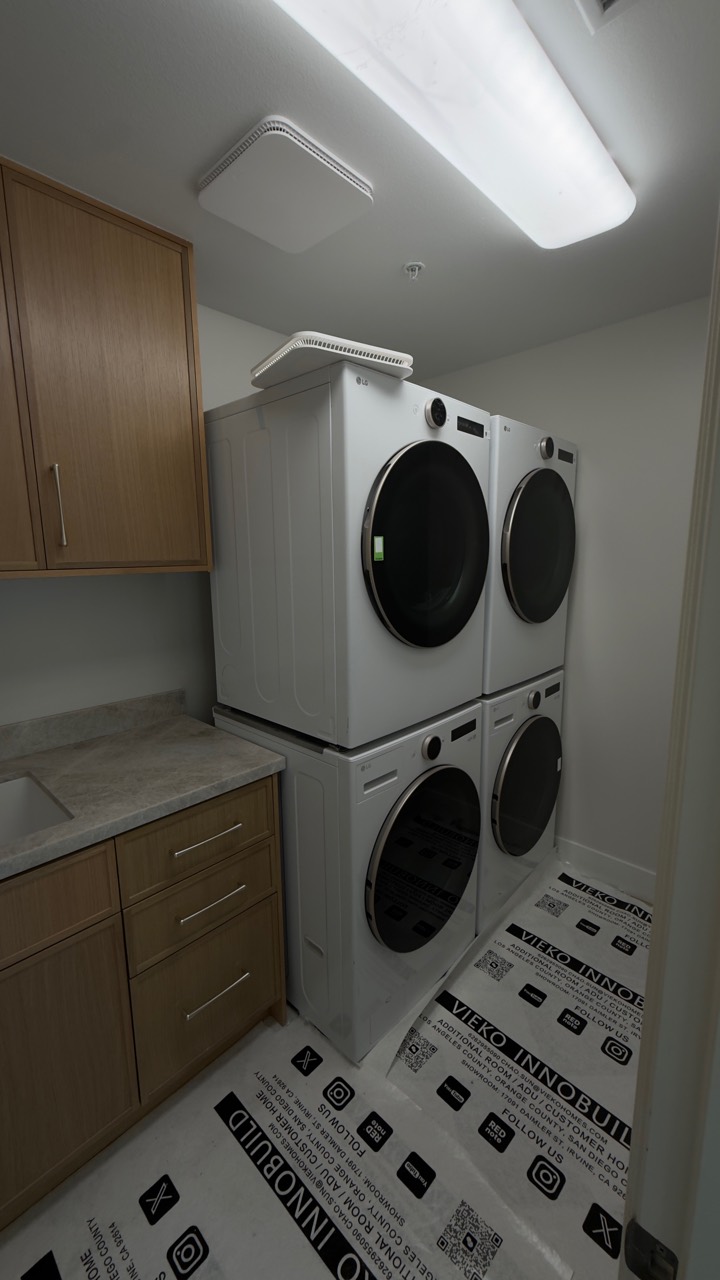 Four-unit washer and dryer installation by Peerless Group in Orange County, CA