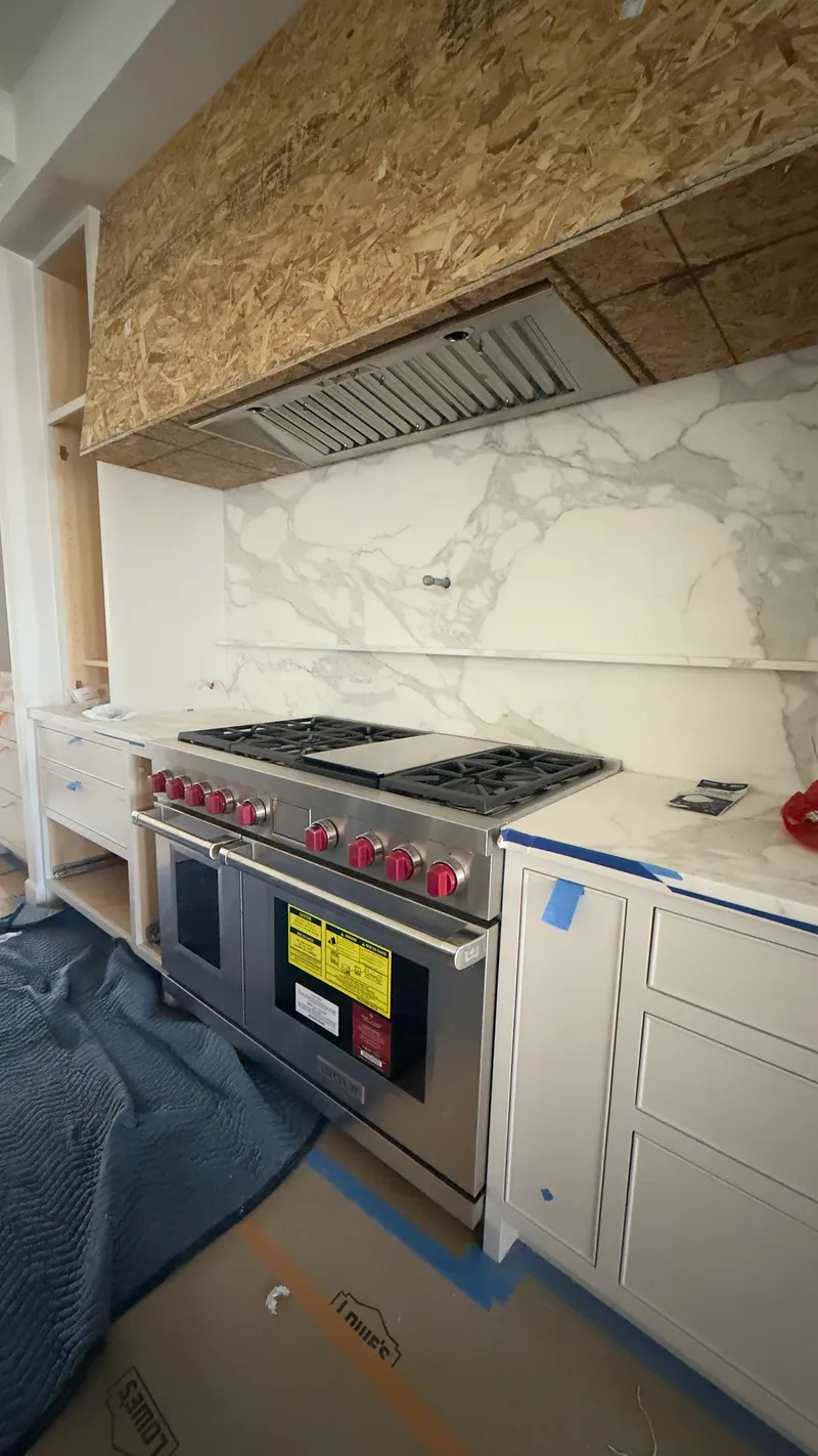 Wolf 48″ Range & 48″ Liner Hood installation in San Clemente by Peerless Group