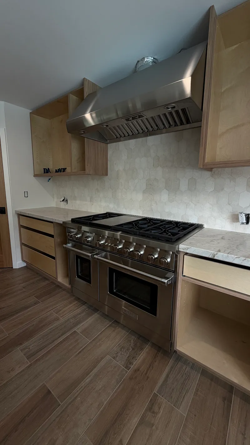 Wolf 48″ Range and Wolf Hood installation in Santa Ana by Peerless Group