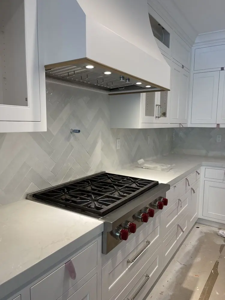 Wolf Cooktop in White Kitchen installation in Shady Canyon