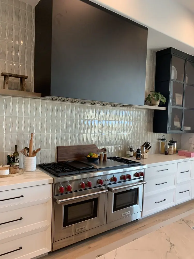 Wolf Dual-Fuel Range & Hood installation in Newport Beach