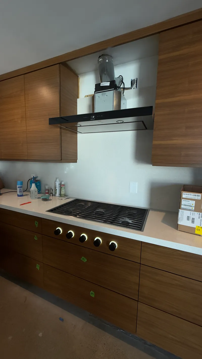 Wolf Module Cooktop & Wolf Hood installation in Villa Park by Peerless Group