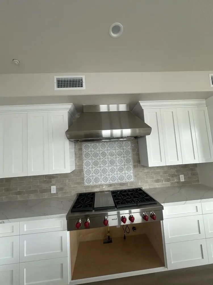 Wolf Range & Decorative Tile Hood installation in Newport Coast