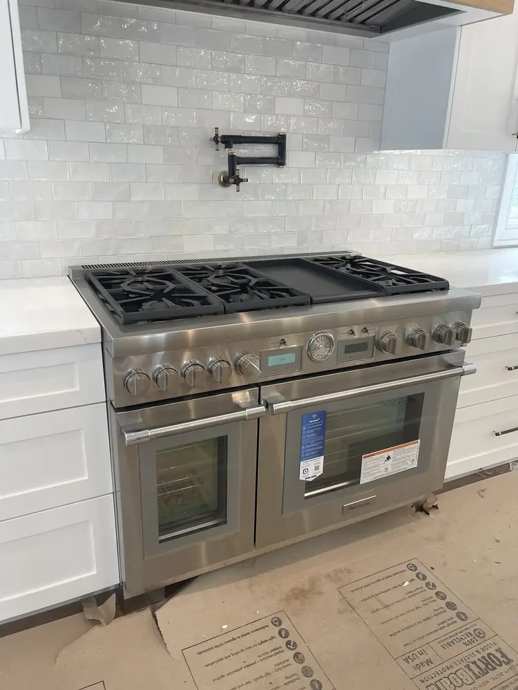 Wolf Range with Pot Filler installation in Laguna Beach